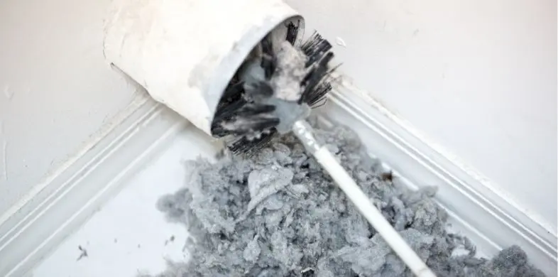 dryer vent being cleaned with a pro tool
